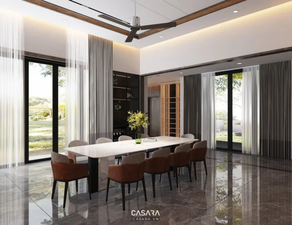 Phòng ăn hiện đại, sang trọng với cửa kính lớn nhìn ra vườn.