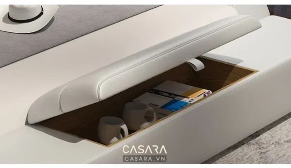 Chi tiết ngăn kéo ẩn trong ghế sofa màu trắng tinh tế.