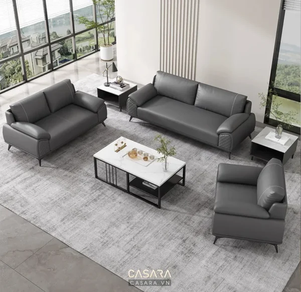 Phòng khách hiện đại với bộ sofa da xám tinh tế, sang trọng.