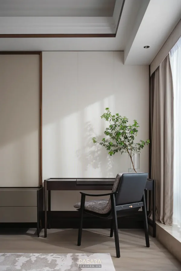 Góc làm việc tối giản, tinh tế với cây xanh điểm nhấn.