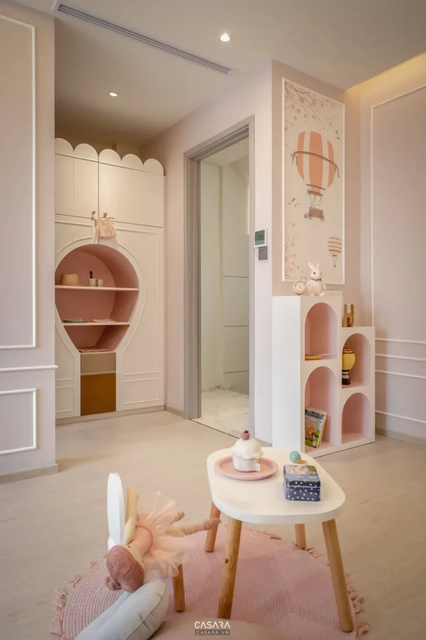 Góc phòng trẻ em màu hồng ngọt ngào, thiết kế mở hiện đại.