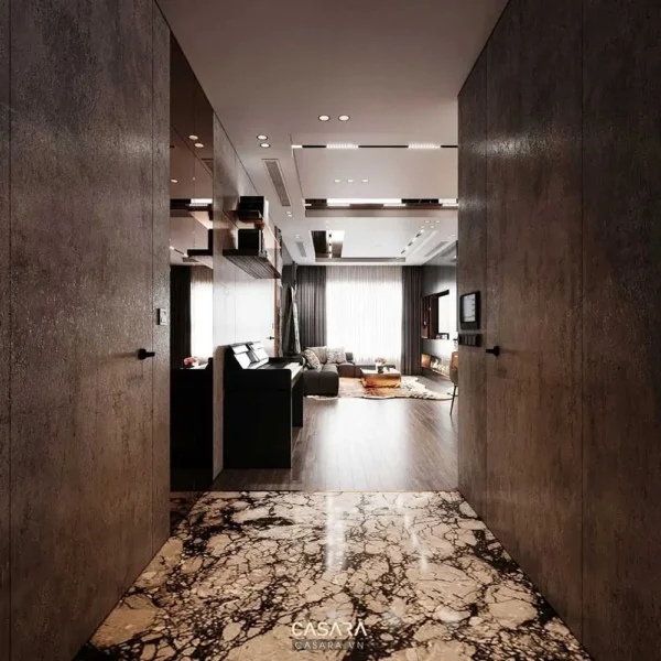 Hành lang sang trọng dẫn vào phòng khách hiện đại, ấm cúng.