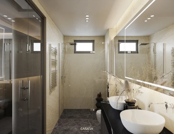 Phòng tắm hiện đại, sang trọng với tông màu be chủ đạo, ánh sáng dịu nhẹ.