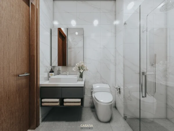 Phòng tắm hiện đại, sang trọng với gạch lát trắng và nội thất gỗ.