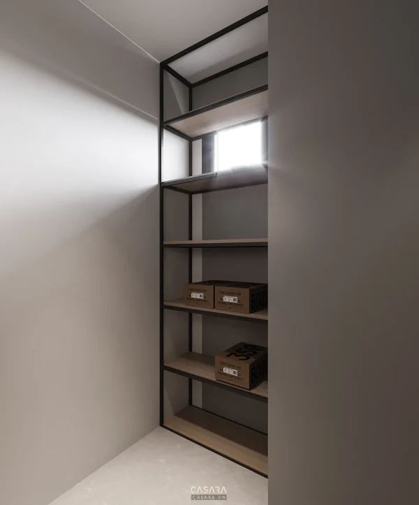 Kệ sách kim loại tối giản, ánh sáng tự nhiên chiếu vào không gian.