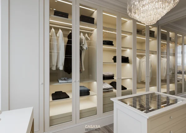 Phòng thay đồ hiện đại, sang trọng với tủ kính trắng tinh tế.