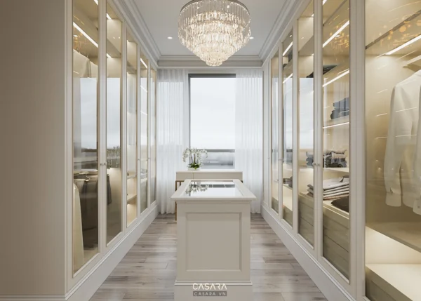 Phòng thay đồ sang trọng với tủ kính trắng và đèn chùm lộng lẫy.