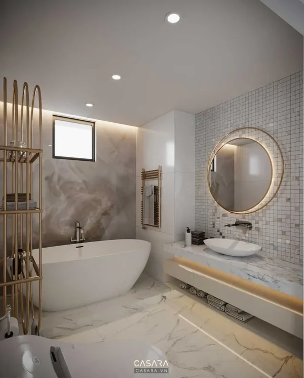 Phòng tắm hiện đại, sang trọng với tông màu trắng chủ đạo và điểm vàng.