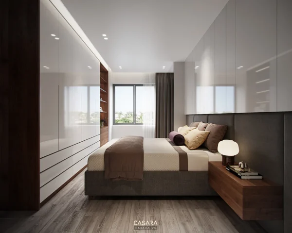 Phòng ngủ hiện đại, sang trọng với nội thất tối giản, ánh sáng dịu nhẹ.