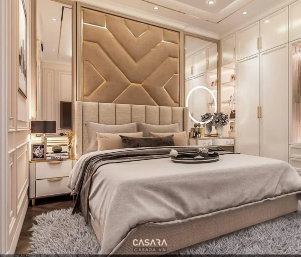 Phòng ngủ sang trọng với giường lớn và tủ quần áo âm tường.