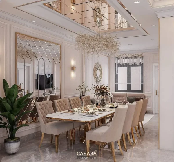 Phòng ăn sang trọng với nội thất màu be, vàng kim nổi bật.