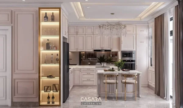 Phòng bếp hiện đại, sang trọng với tủ bếp trắng tinh tế.
