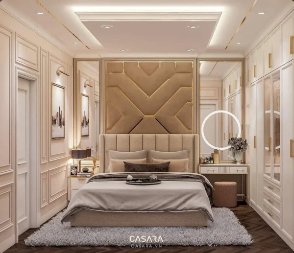 Phòng ngủ sang trọng, ấm cúng với tông màu kem và vàng chủ đạo.