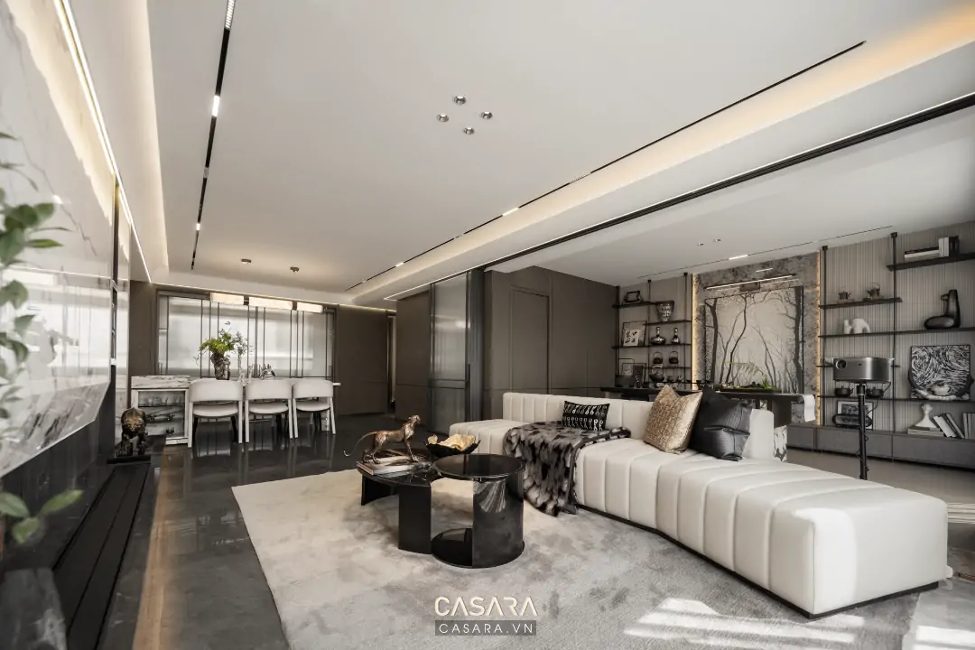 căn hộ 40m2 với phòng khách liền bếp hiện đại và sofa nhỏ