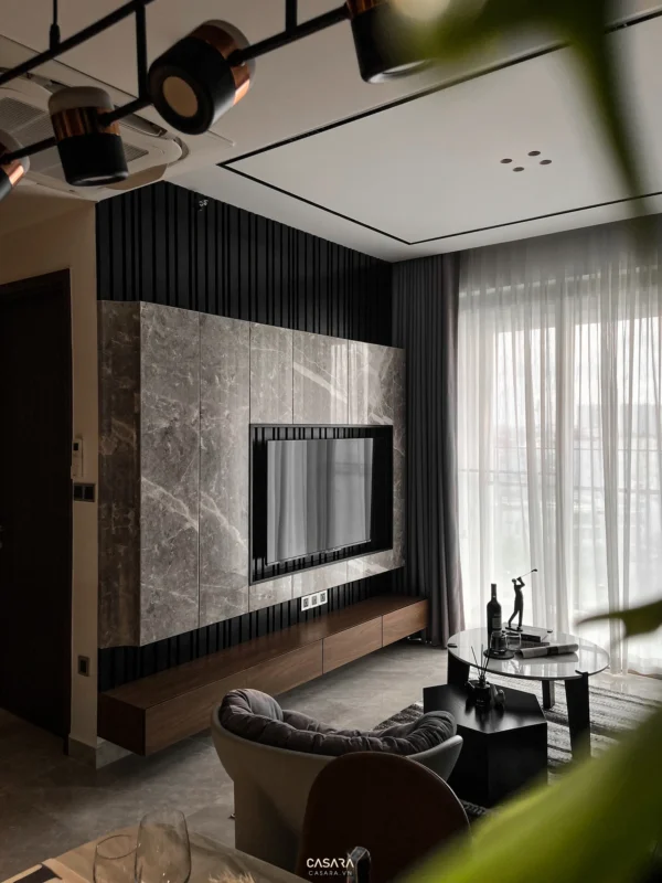 Phòng khách hiện đại, sang trọng với tông màu đen, xám chủ đạo.