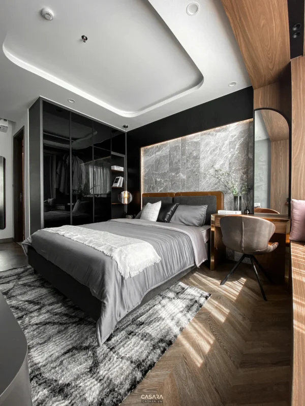 Phòng ngủ hiện đại, sang trọng với tông màu xám và gỗ ấm áp.