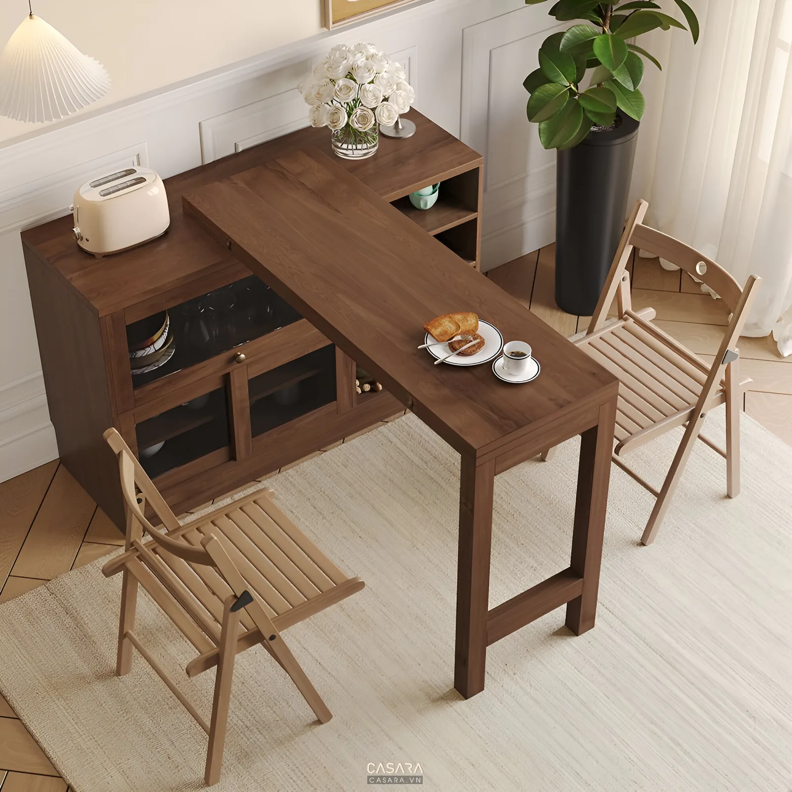 Bàn ăn gỗ gọn với ghế đơn và khoảng thao tác quanh bàn