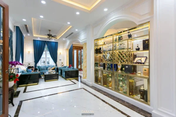 Phòng khách sang trọng với nội thất hiện đại, tông xanh chủ đạo.