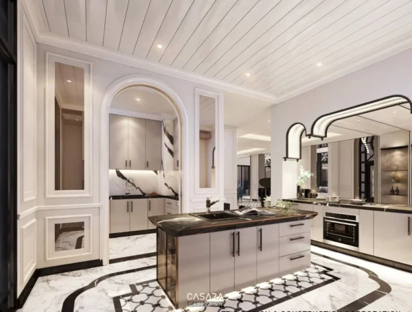 Phòng bếp tân cổ điển sang trọng với nội thất trắng và đen tinh tế.