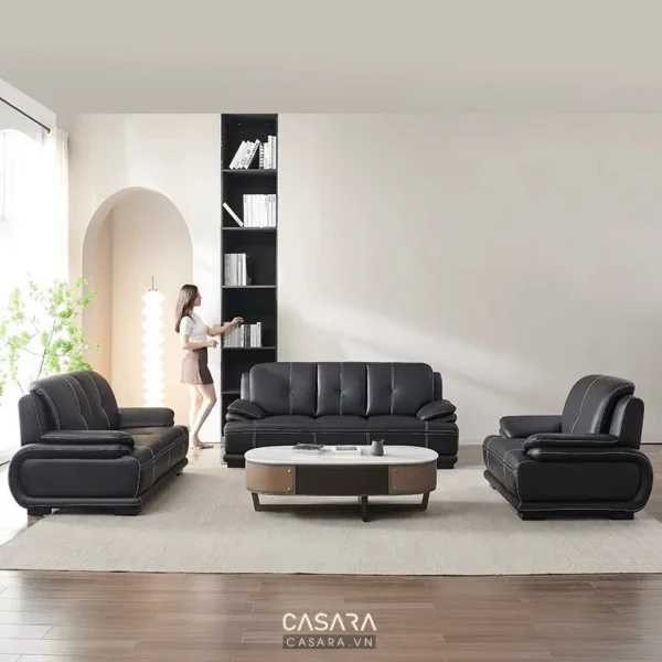Bộ sofa da đen hiện đại, sang trọng trong không gian phòng khách tối giản.