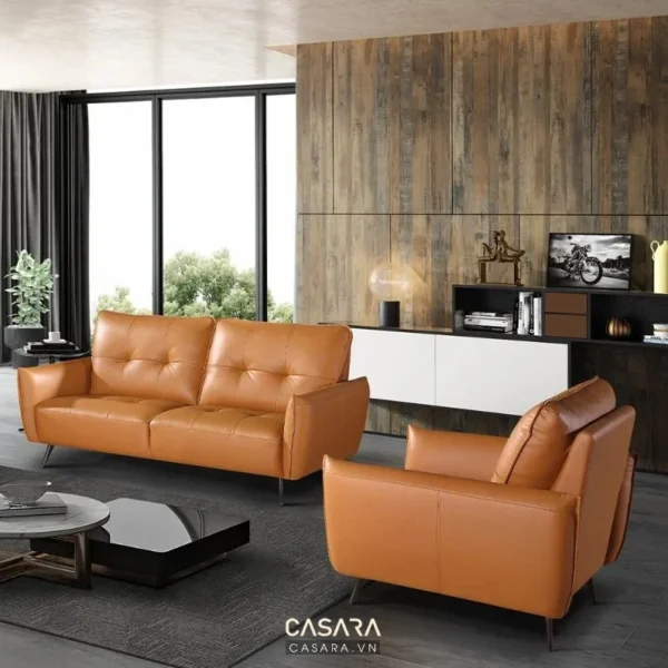 Phòng khách hiện đại với sofa da cam nổi bật, sang trọng.