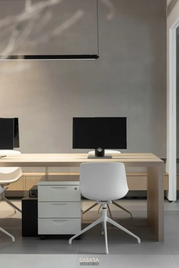 Không gian làm việc tối giản, hiện đại với tông màu trung tính.