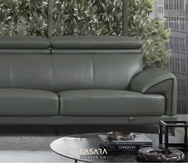 Ghế sofa da màu xanh rêu hiện đại, sang trọng trong không gian sống.
