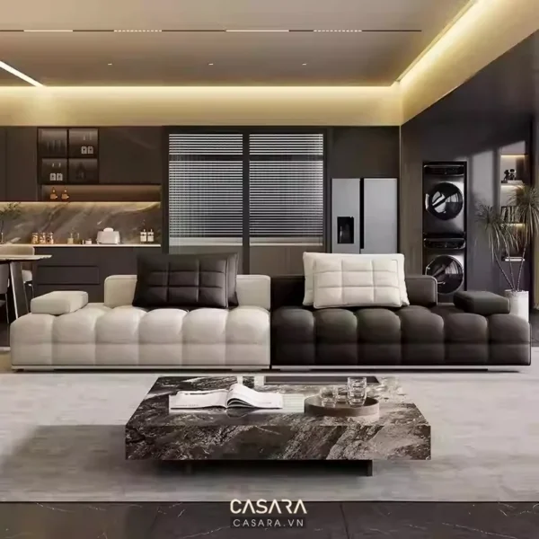 Phòng khách hiện đại, sang trọng với nội thất tối màu và điểm nhấn ánh sáng vàng.