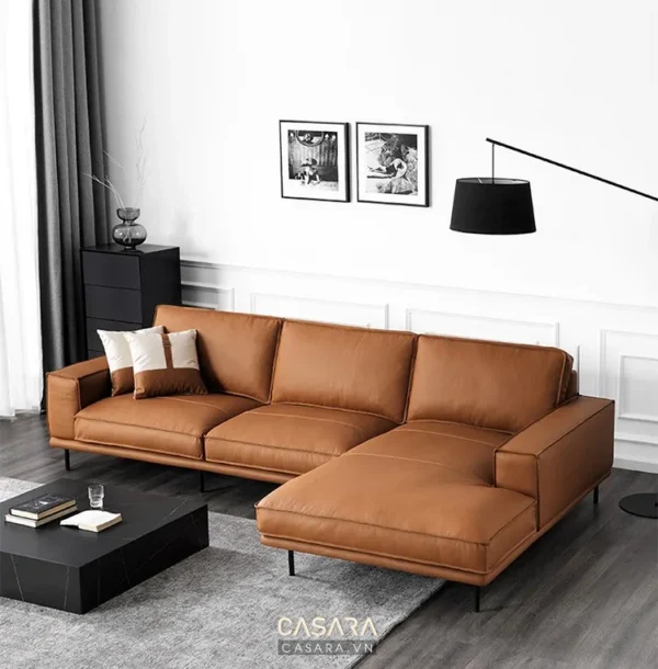 Bộ sofa da màu nâu hiện đại, sang trọng trong không gian phòng khách.