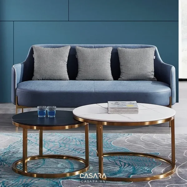 Bộ sofa xanh dương hiện đại kết hợp bàn trà tròn sang trọng.