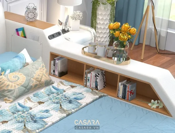 Góc phòng ngủ hiện đại, sang trọng với kệ sách trắng tinh tế.