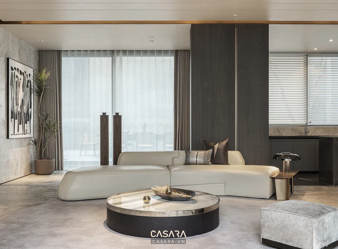 thiết kế phòng khách chung cư đơn giản với sofa chữ L và kệ tivi treo tường