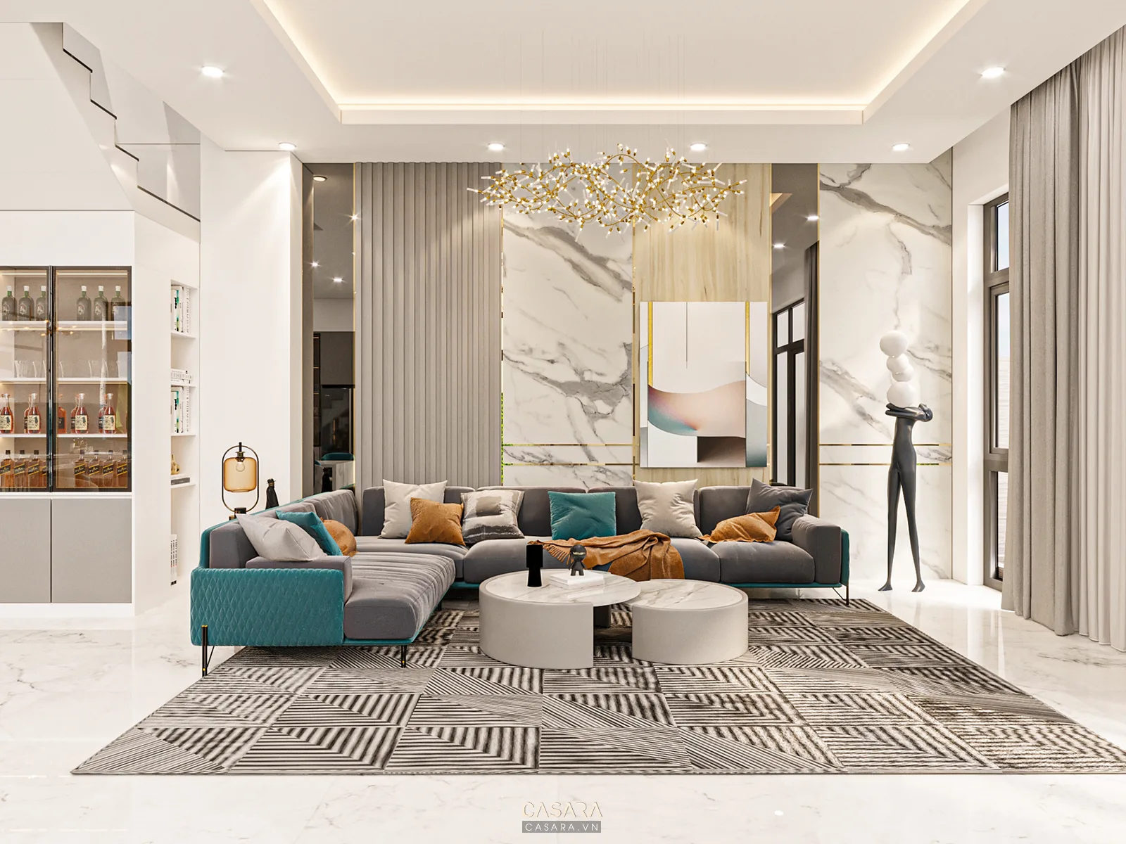 Phòng khách cao cấp có mảng đá vân lớn, sofa xanh và đèn chùm trang trí