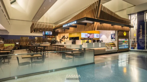 Khu vực ăn uống Pizza Kitchen hiện đại, sáng sủa trong trung tâm thương mại.