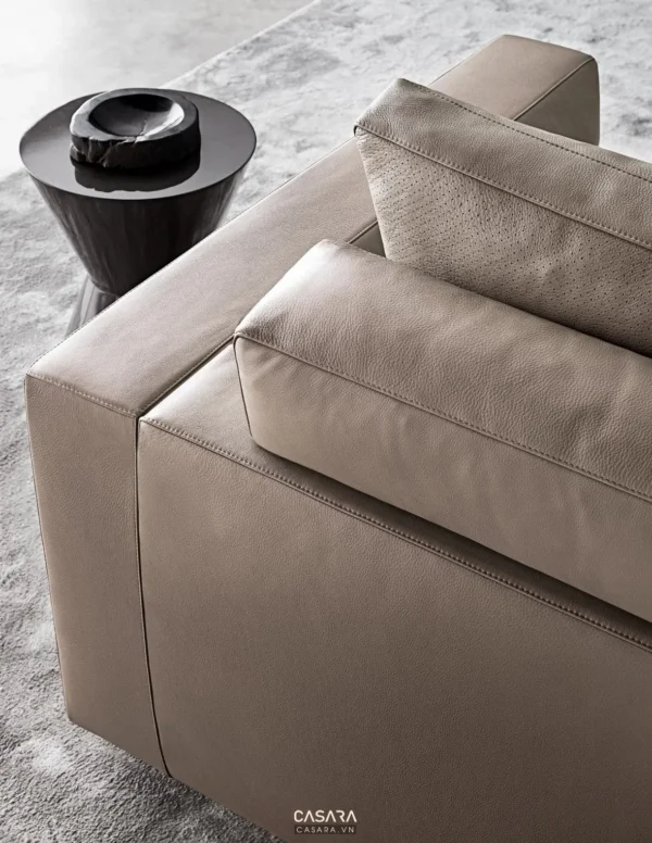 Góc sofa da màu be hiện đại, sang trọng trong không gian tinh tế.
