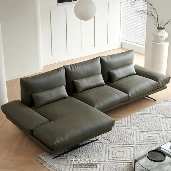 Ghế sofa da màu xanh rêu hiện đại, thiết kế góc chữ L rộng rãi.