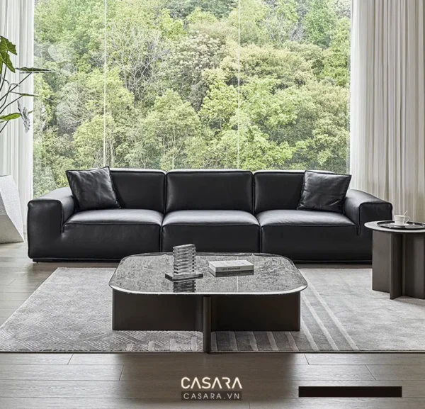 Bộ sofa đen hiện đại, sang trọng trong không gian phòng khách tối giản.