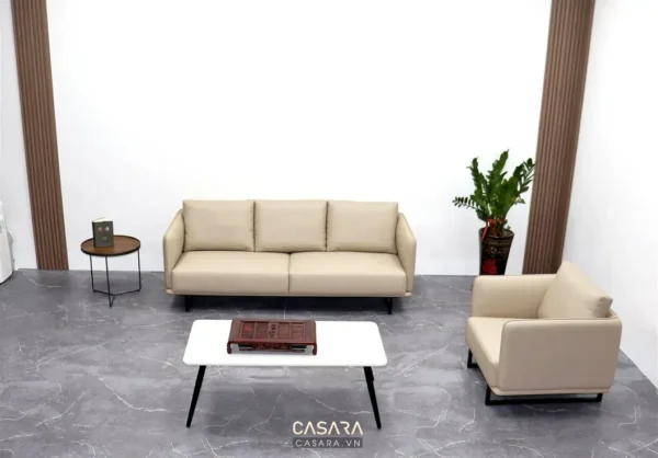 Phòng khách hiện đại với sofa và bàn trà trắng tinh tế.