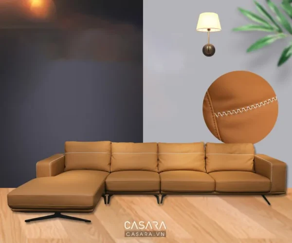 Góc phòng khách hiện đại với sofa góc màu nâu da cam ấm cúng.