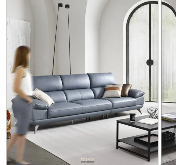 Phòng khách hiện đại với bộ sofa da màu xanh dương nổi bật.