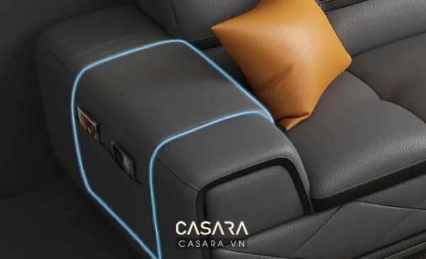 Chiếc ghế sofa cao cấp màu đen với gối tựa êm ái, thiết kế hiện đại.