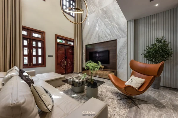 Phòng khách hiện đại, sang trọng với nội thất tinh tế, ánh sáng ấm áp.