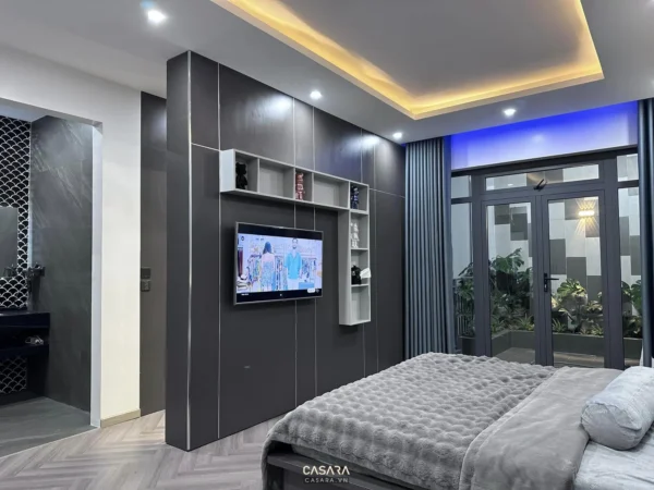 Phòng ngủ hiện đại với tông màu xám chủ đạo, thiết kế tinh tế.