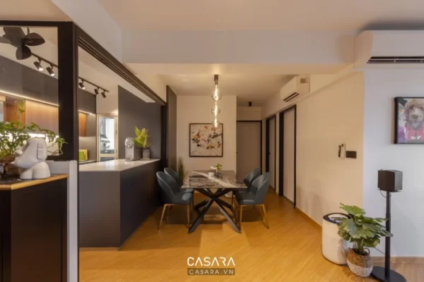 Phòng ăn hiện đại, tối giản với bàn ghế ăn và khu bếp mở thông minh.