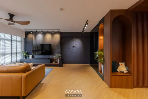 Phòng khách hiện đại với tông màu trầm ấm, điểm nhấn gỗ tự nhiên.