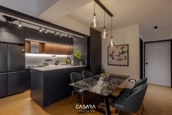 Phòng bếp tối giản, hiện đại với đảo bếp và bàn ăn sang trọng.