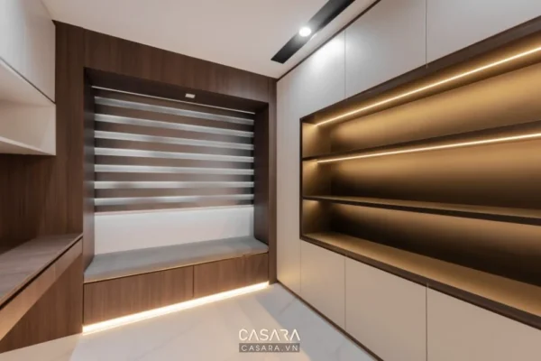 Nội thất tủ âm tường hiện đại, sang trọng với ánh sáng vàng ấm áp.