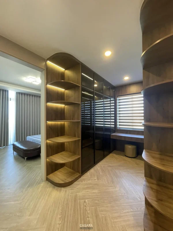 Nội thất phòng ngủ hiện đại, sang trọng với kệ tủ gỗ độc đáo.