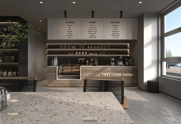 Quán cà phê hiện đại với quầy bar gỗ và thực đơn đa dạng.