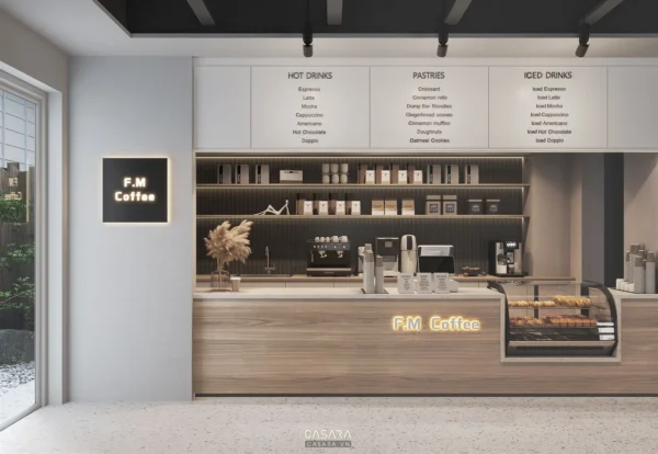 Quán cafe nhỏ có quầy pha chế gọn, menu tường và kệ trưng bày sáng
